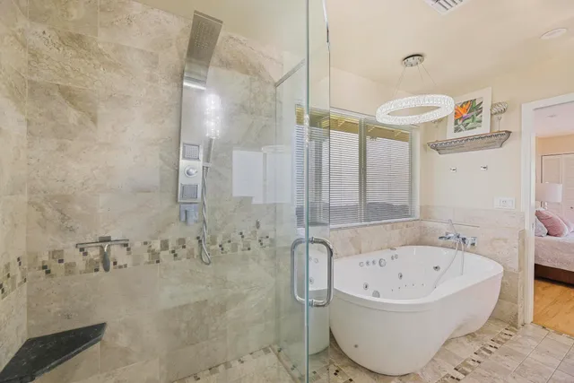 a view of backyard with a large tree