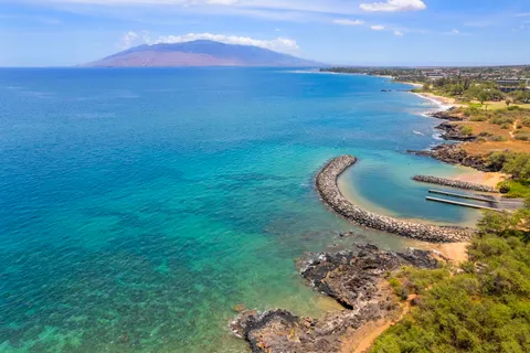 a view of a city with an ocean
