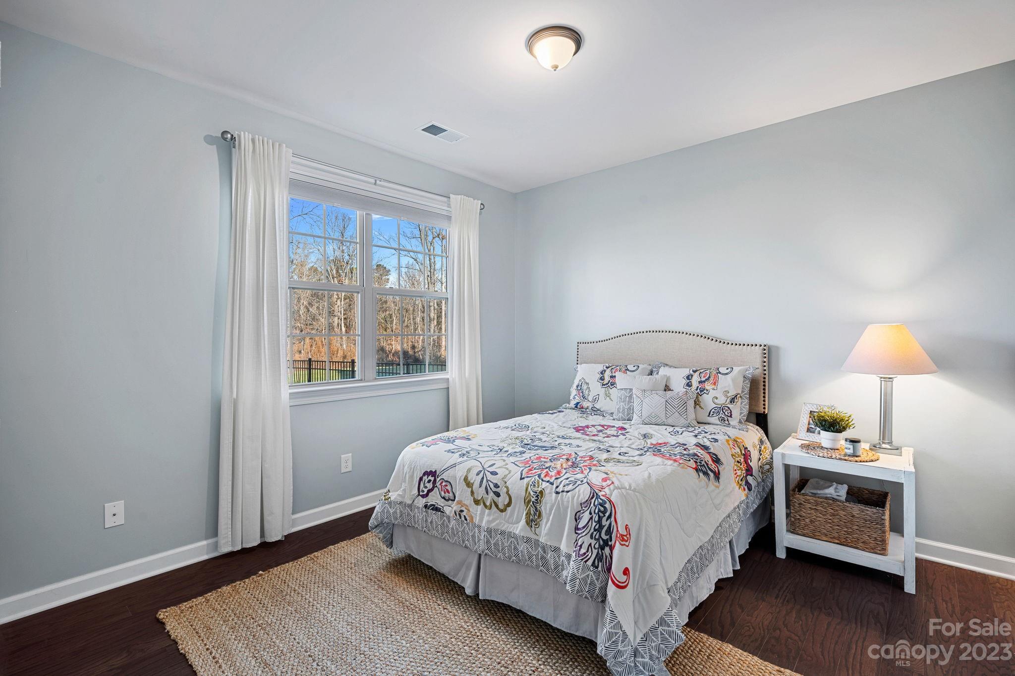 17423 Shearer Road Davidson, NC 28036 - Photo 21 of 48 a bedroom with a bed and a window
