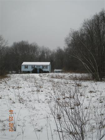 269 Torrey Road Southbridge, MA 01550 - Photo 2 of 5 a view of a backyard of the house