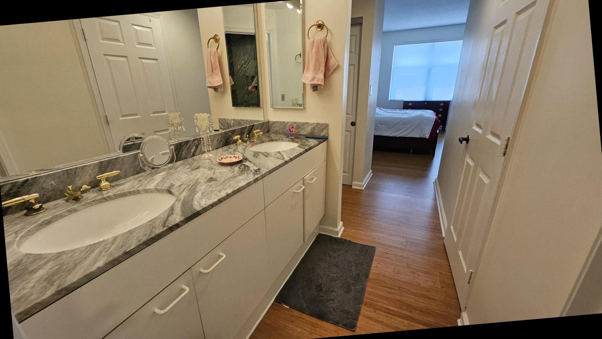 3801 Canterbury Road, Unit 409 Baltimore, MD 21218 - Photo 13 of 31 Primary Bathroom Double Vanity