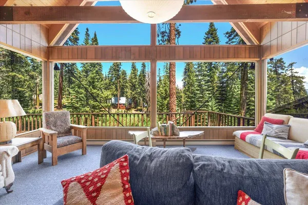 a outdoor living space with patio furniture and a potted plant