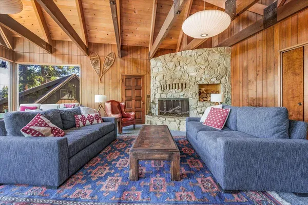 a kitchen with a stove sink and cabinets