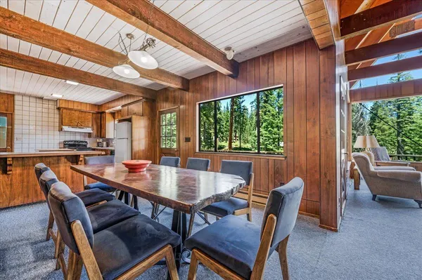 a view of a kitchen with a sink and cabinets