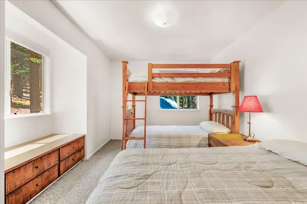 a view of a room with a wooden floor