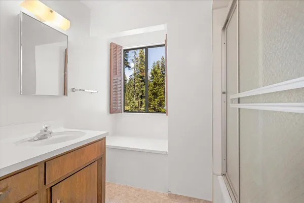 a view of a lake with mountains in the background