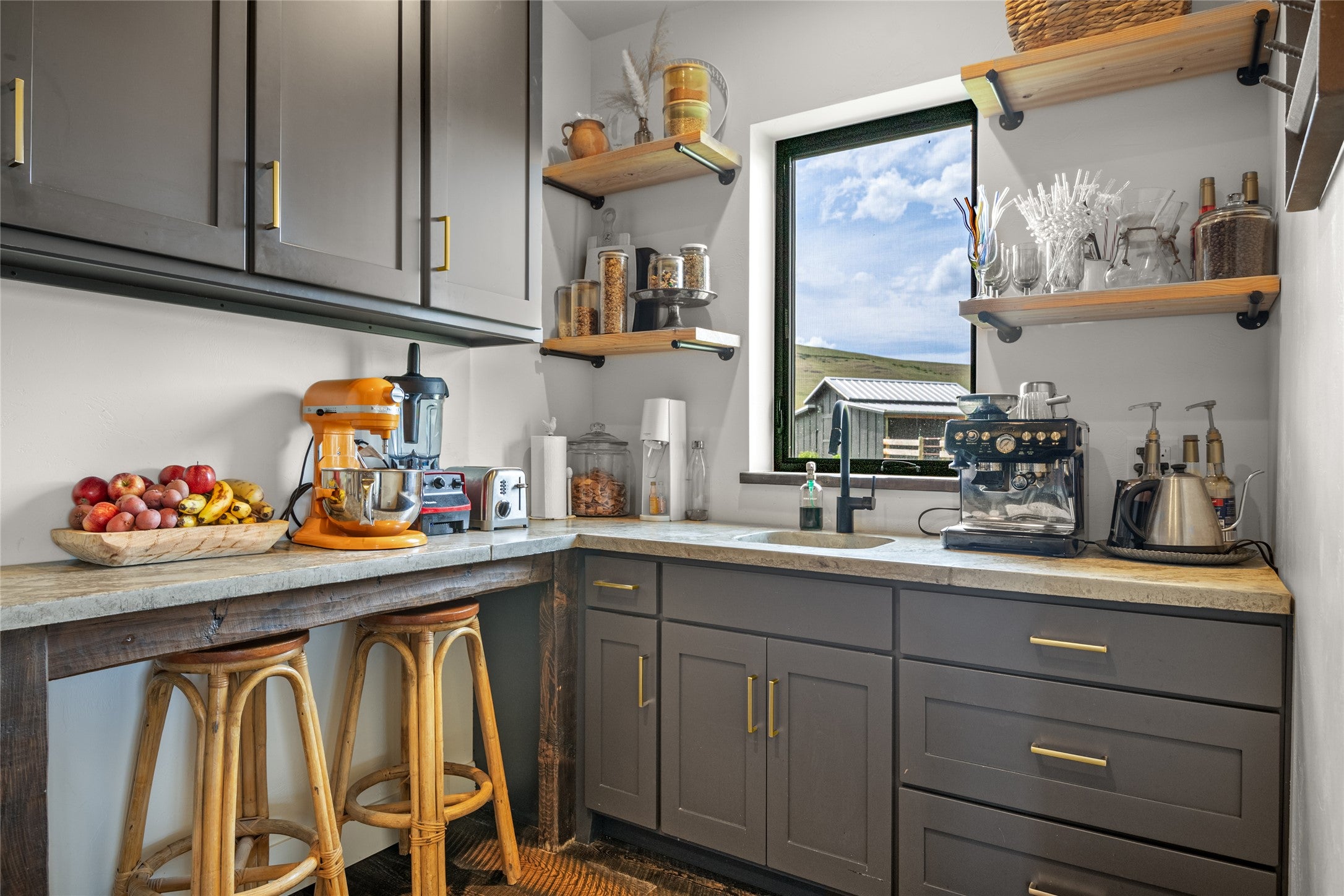 Pantry with built in cabinets & sink.