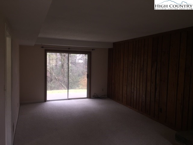 465 Highland Avenue Boone, NC 28607 - Photo 5 of 10 a view of empty room with floor and fan