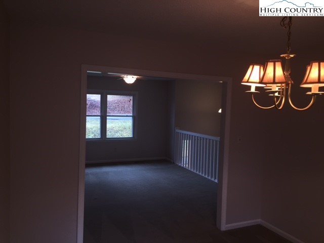 465 Highland Avenue Boone, NC 28607 - Photo 7 of 10 a view of a hall with a window
