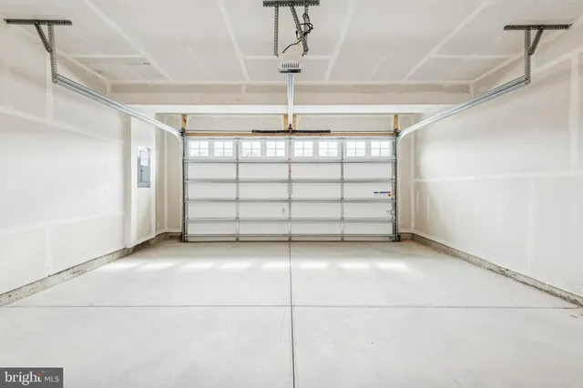 a view of a room with toys and flat screen tv