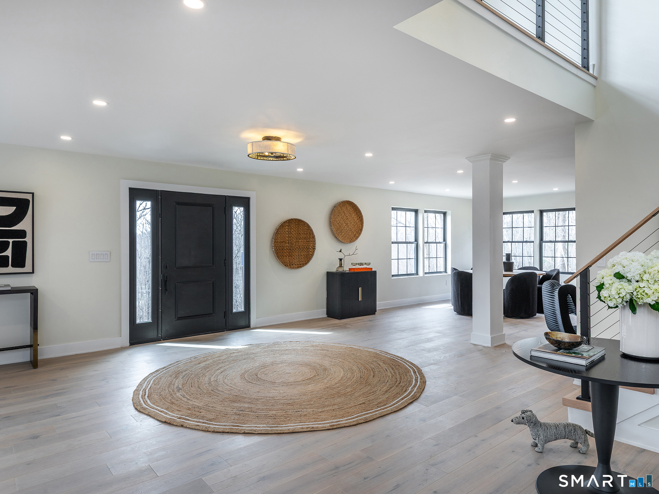 53 Mountain Lake Road Warren, CT 06777 - Photo 17 of 40 a kitchen with a table and chairs