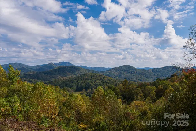a view of mountains and valleys