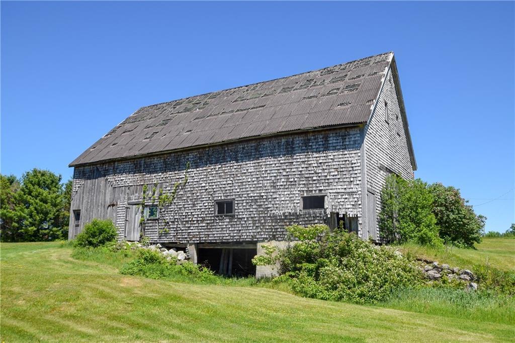 234 Retreat Road Island Falls, ME 04747 - Photo 10 of 35 The interior of the barn has lots of...