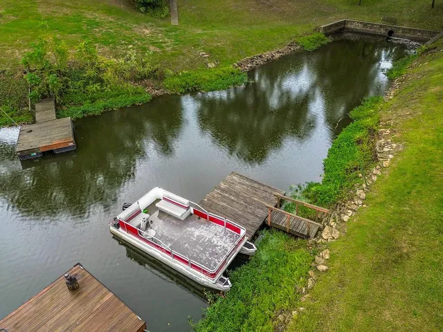 $425,000 | 715 Northwest South Shore Drive, Lake Waukomis, MO 64151