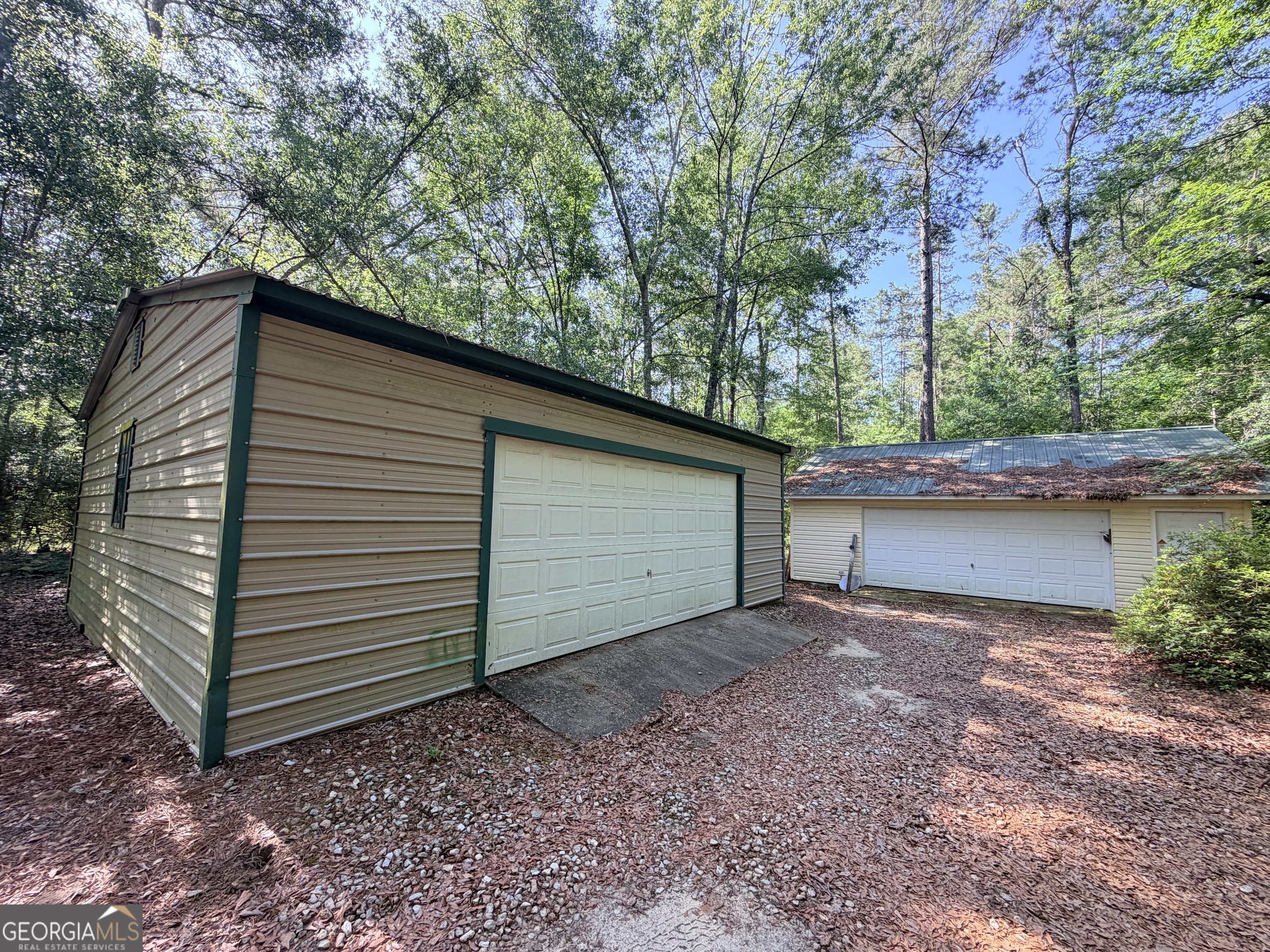 3349 East River Road Bainbridge, GA 39817 - Photo 13 of 18 a backyard of a house with lots of green space