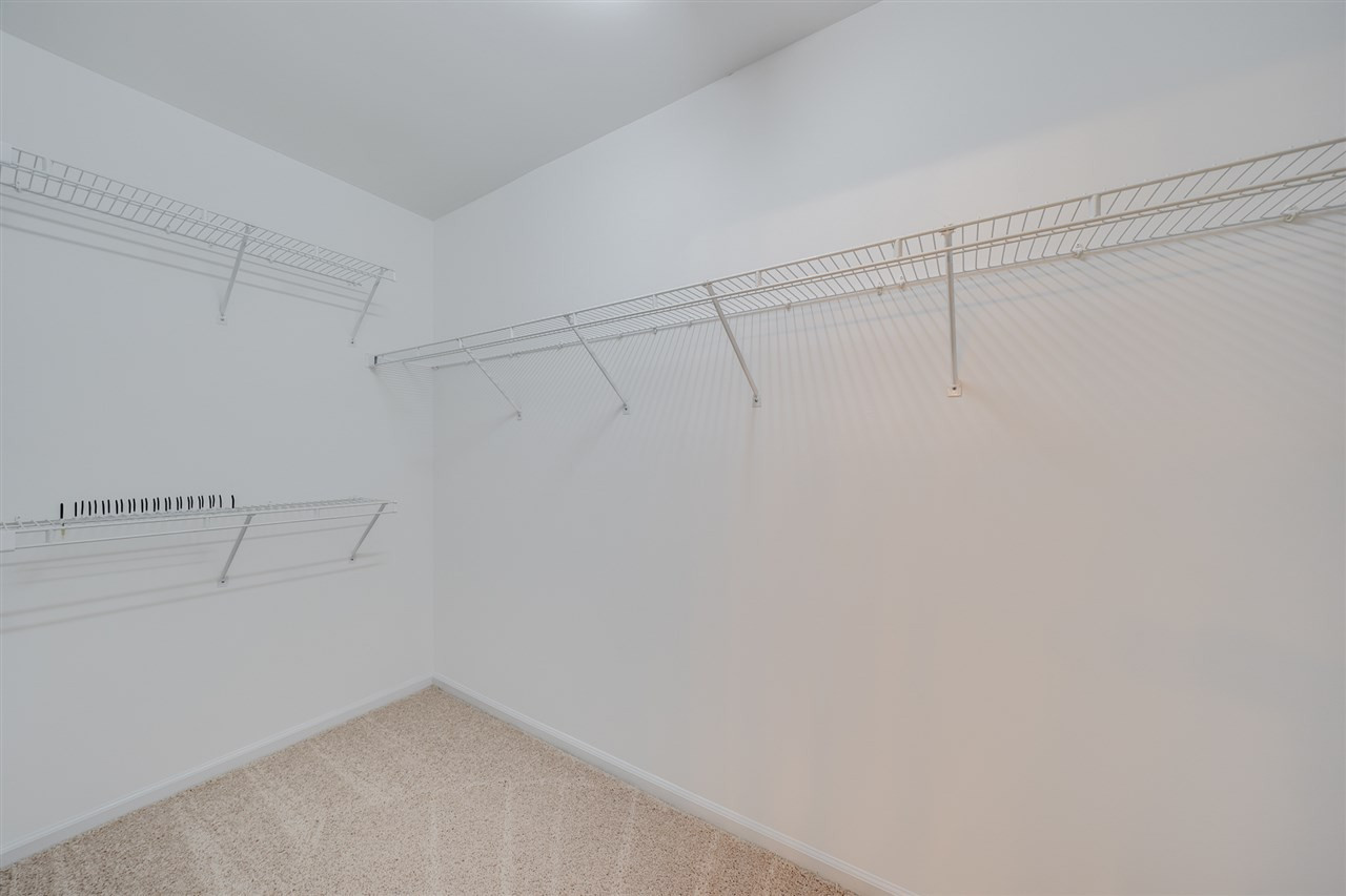 8805 Attingham Drive Raleigh, NC 27615 - Photo 21 of 30 Walk-in Closet