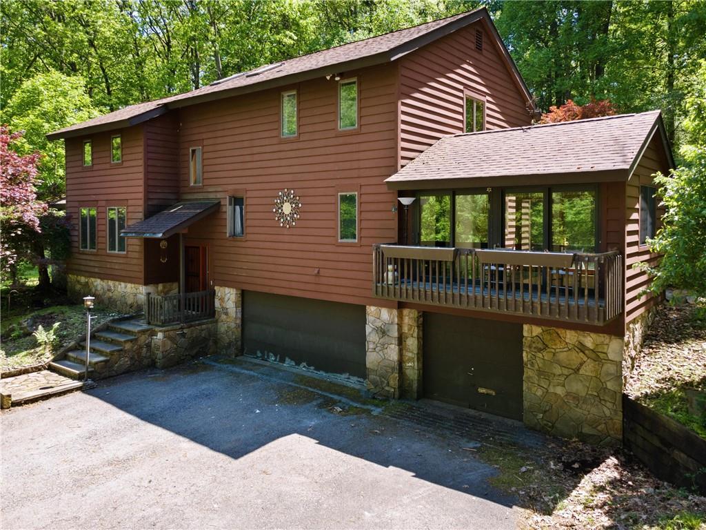 150 Dodds Road Butler, PA 16002 - Photo 2 of 37 a front view of a house with garden