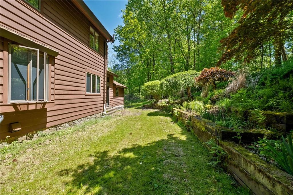 150 Dodds Road Butler, PA 16002 - Photo 35 of 37 a view of a backyard with plants