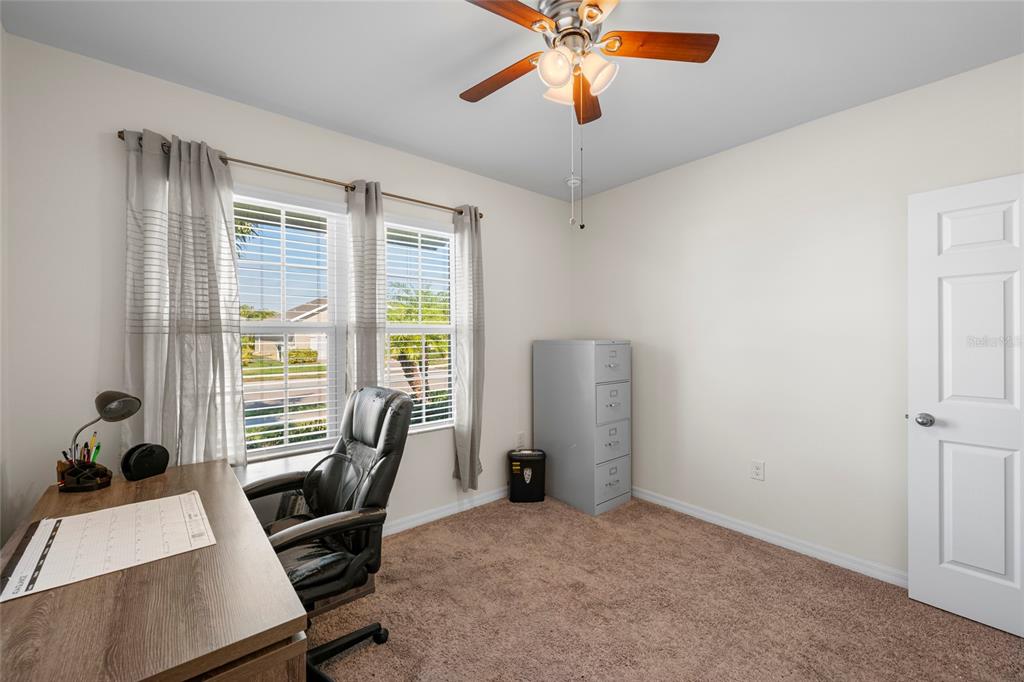 8921 Excelsior Loop Venice, FL 34293 - Photo 18 of 26 a workspace with furniture and a window