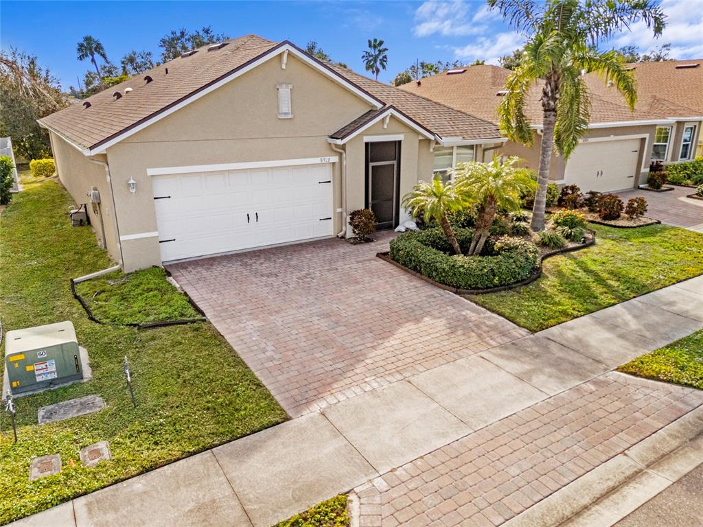 8921 Excelsior Loop Venice, FL 34293 - Photo 2 of 26 a view of a house with a yard