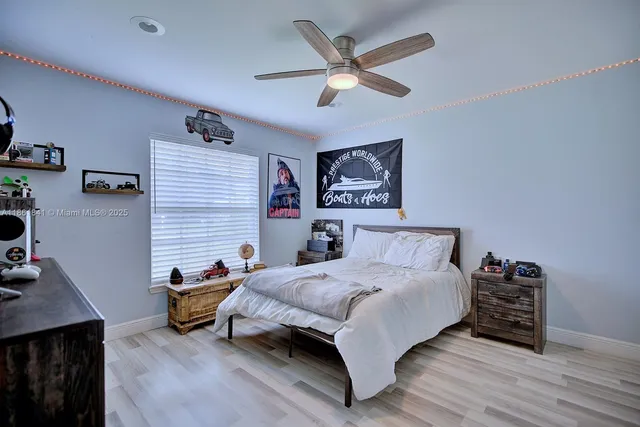 a room with furniture and a flat screen tv