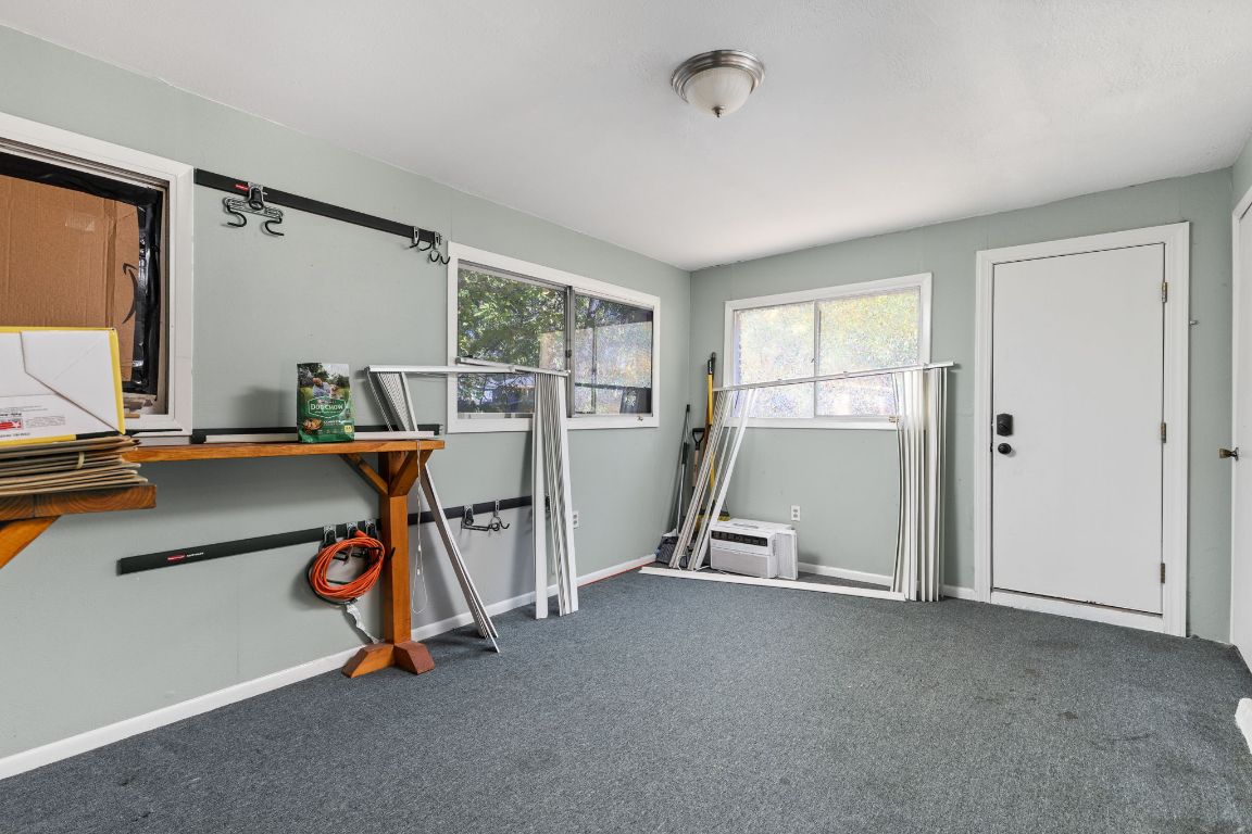 1105 Alegria Road Austin, TX 78757 - Photo 22 of 30 a view of a room with gym equipment