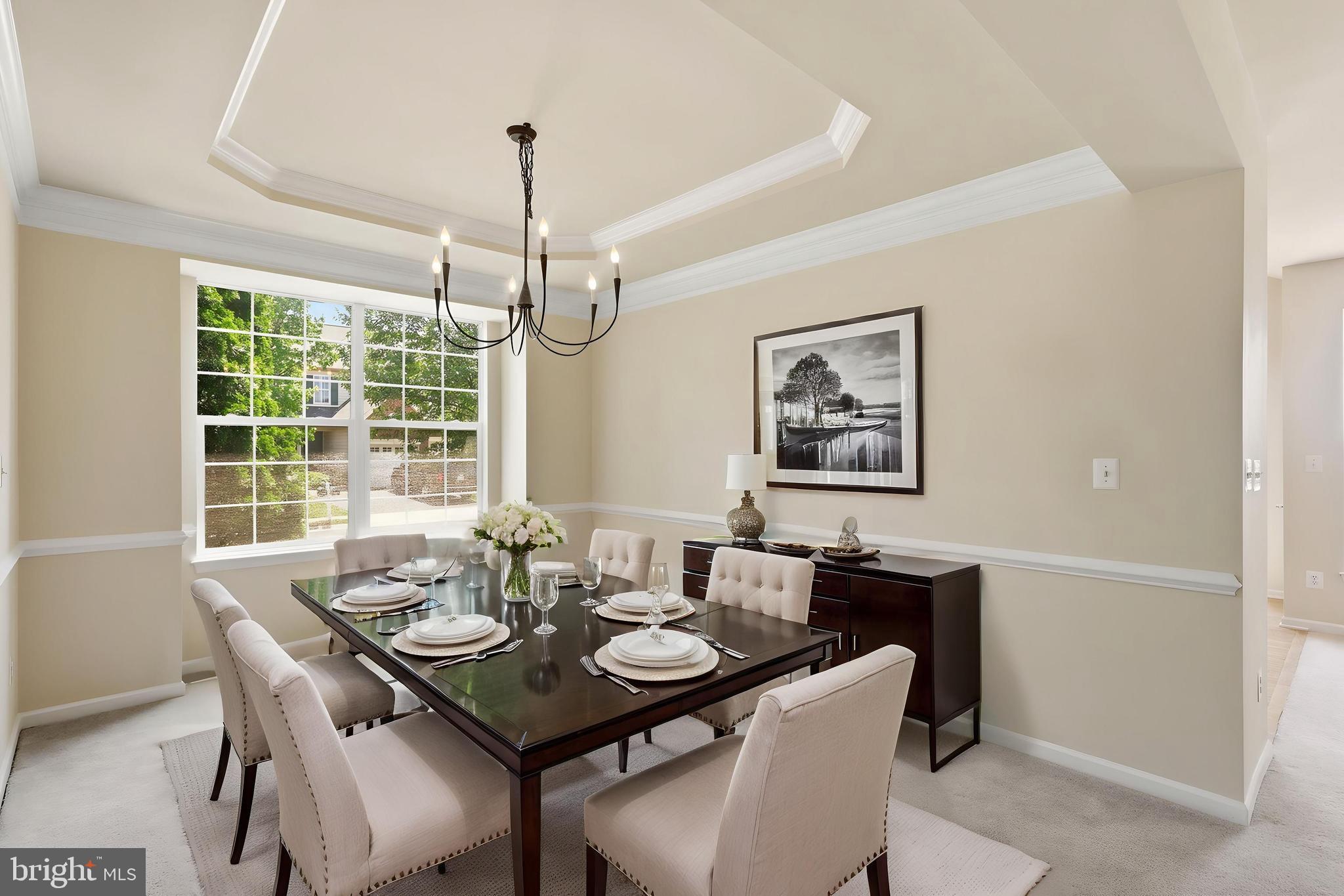 19617 Edgemont Square Ashburn, VA 20147 - Photo 8 of 65 a view of a dining room with furniture window and outside view