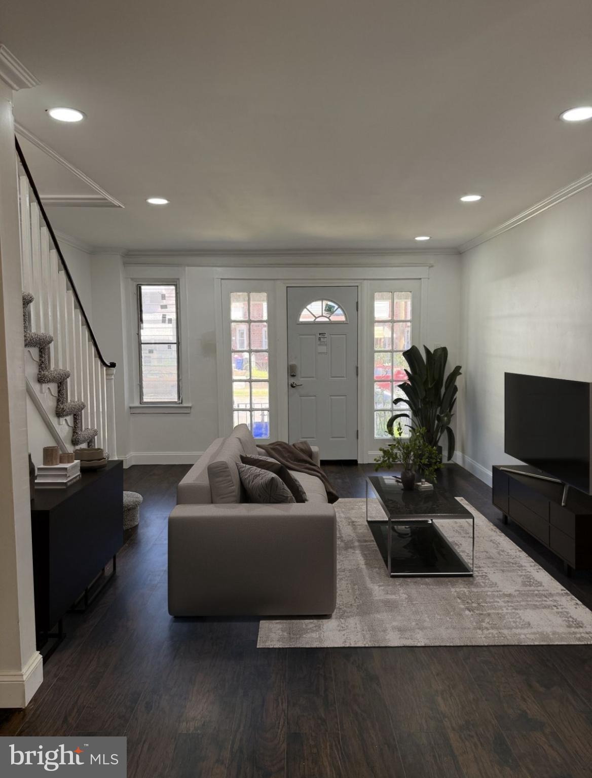 6824 Rodney Street Philadelphia, PA 19138 - Photo 9 of 28 a living room with furniture and a flat screen tv