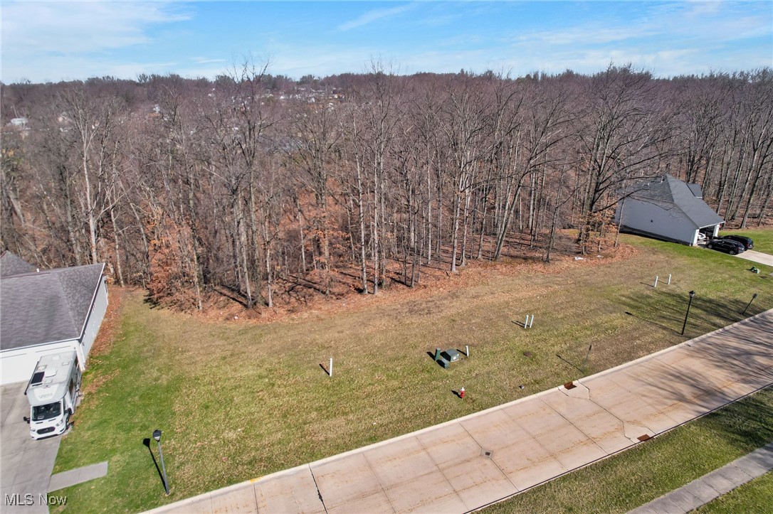 6378 Valley Ranch Drive Maple Heights, OH 44137 - Photo 6 of 12 Bird's eye view featuring a forest view