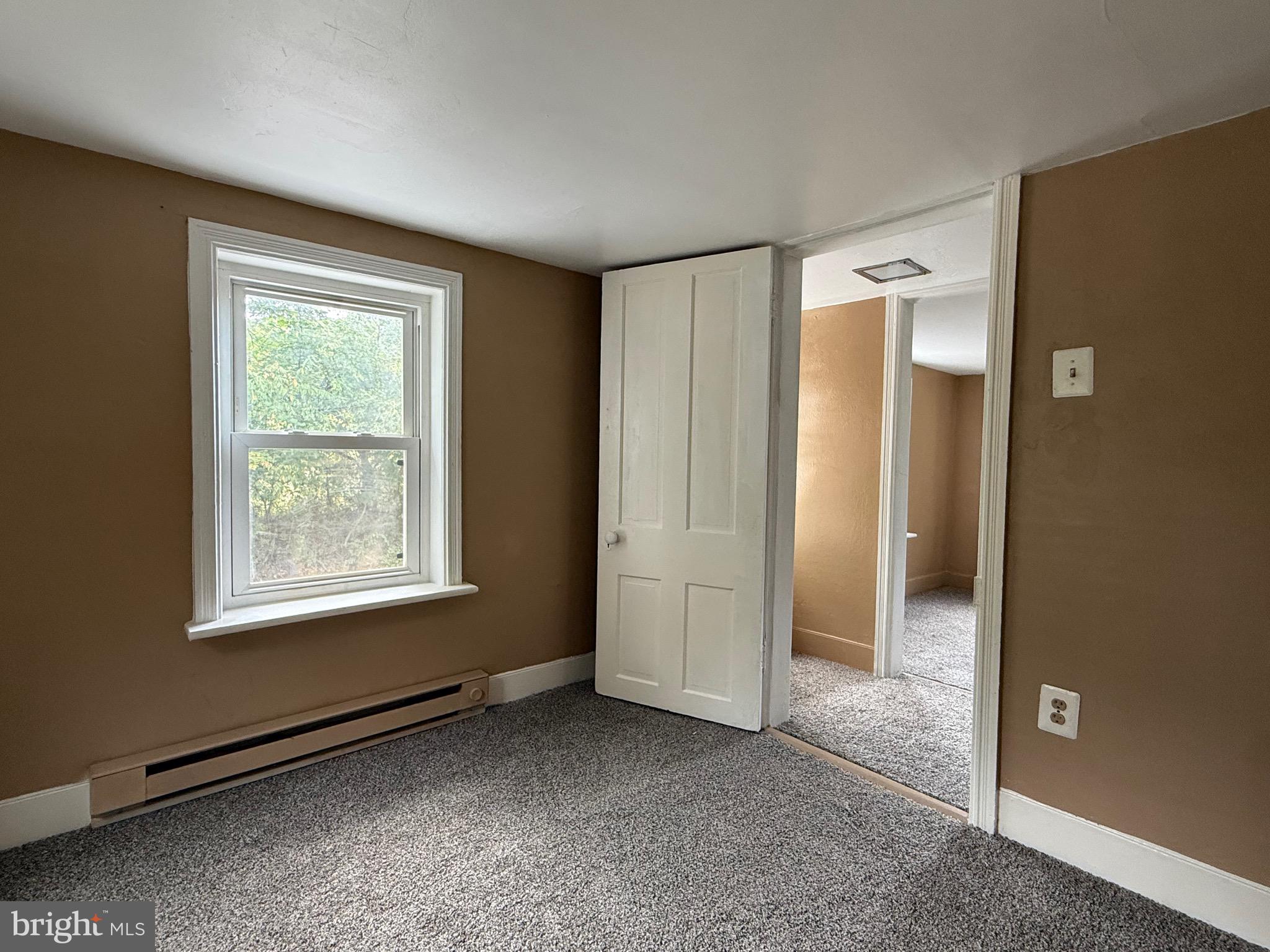 5406 Amos Reeder Road Boonsboro, MD 21713 - Photo 35 of 51 a view of an empty room with window and closet area