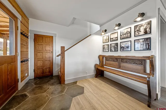 a view of entryway with a front door