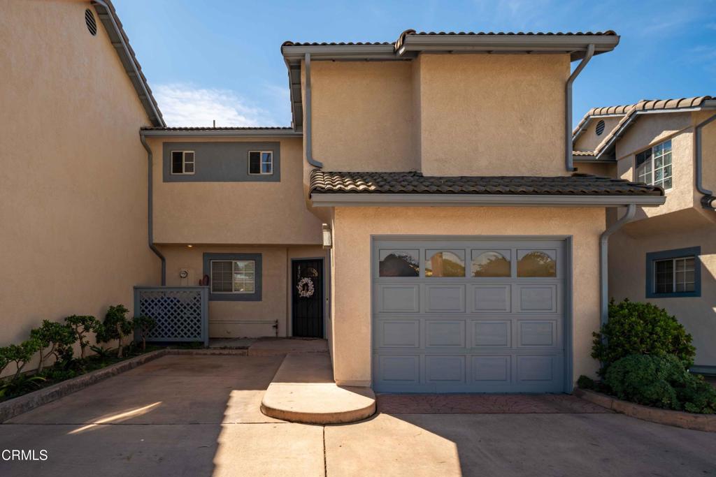 635 East Pleasant Valley Road Port Hueneme, CA 93041 - Photo 2 of 17 a front view of a house with a garden