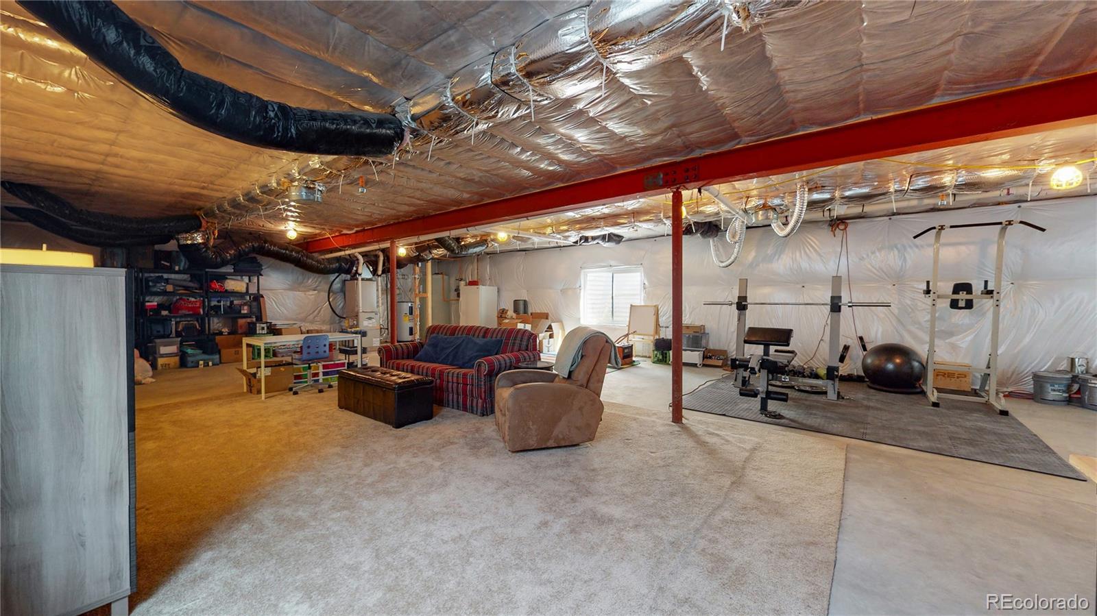 4038 Meadowlark Road Fort Lupton, CO 80621 - Photo 31 of 40 a view of a room with gym equipment