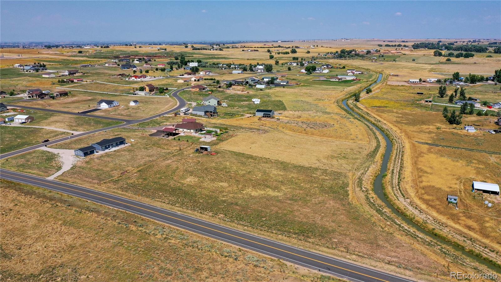 4038 Meadowlark Road Fort Lupton, CO 80621 - Photo 39 of 40 an aerial view of residential houses with outdoor space