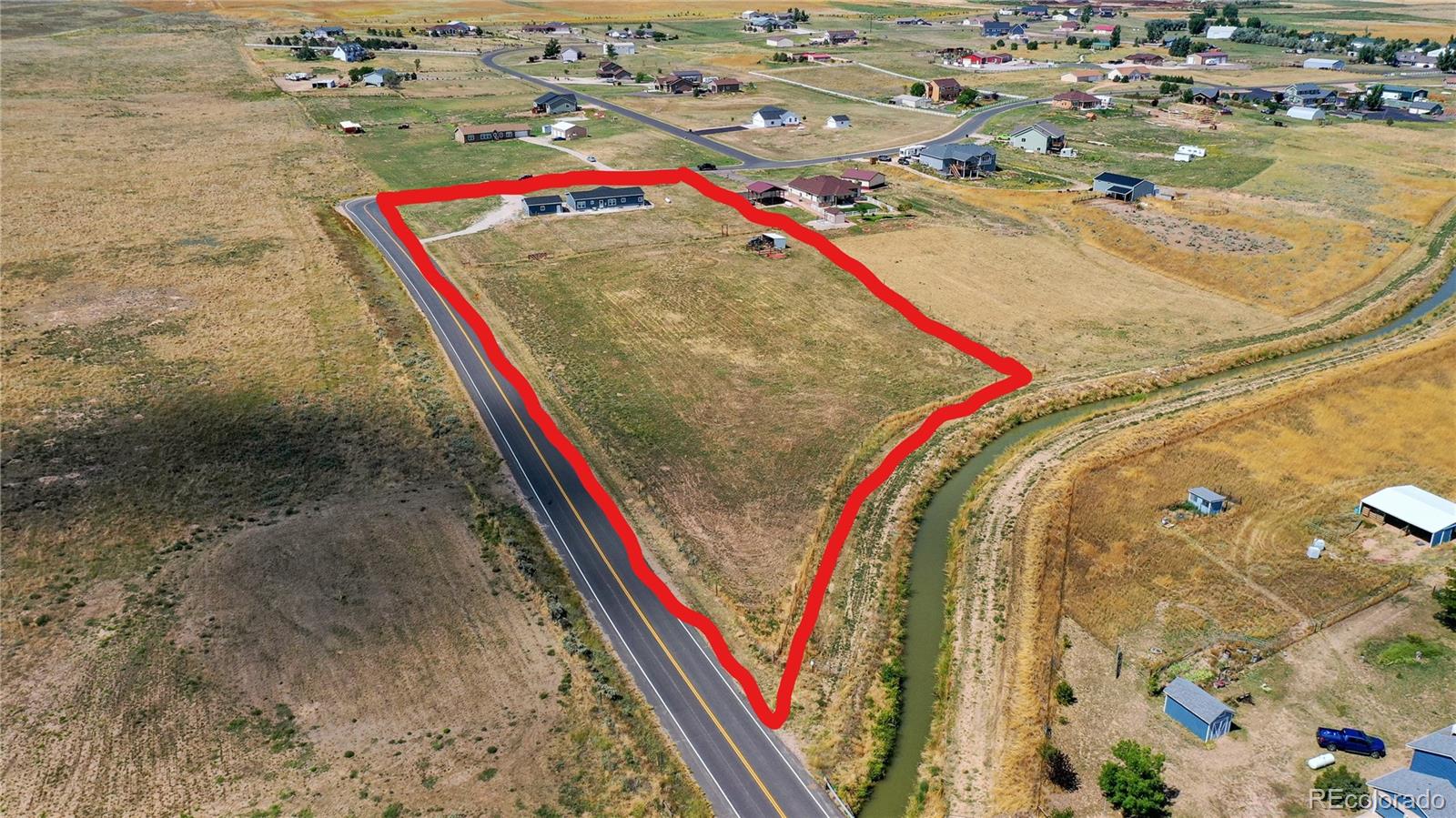 4038 Meadowlark Road Fort Lupton, CO 80621 - Photo 40 of 40 an aerial view of a houses