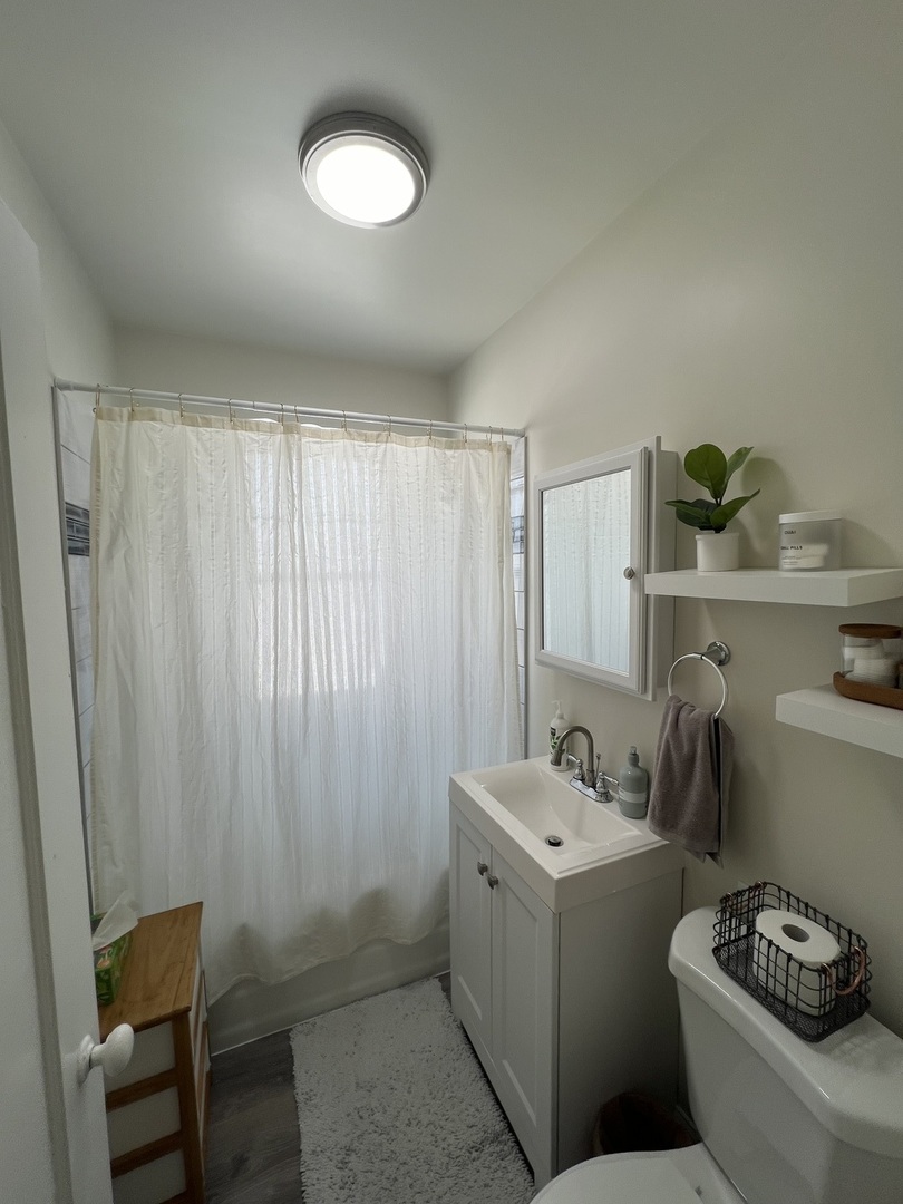 918 Green Bay Road, Unit 3J Winnetka, IL 60093 - Photo 10 of 14 a storage room with a washer and dryer