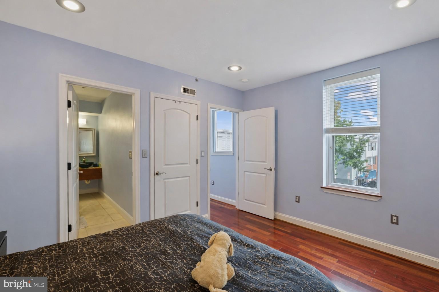 3579 Warder Street Northwest, Unit 3 Washington, DC 20010 - Photo 20 of 25 a bedroom with a bed and a window
