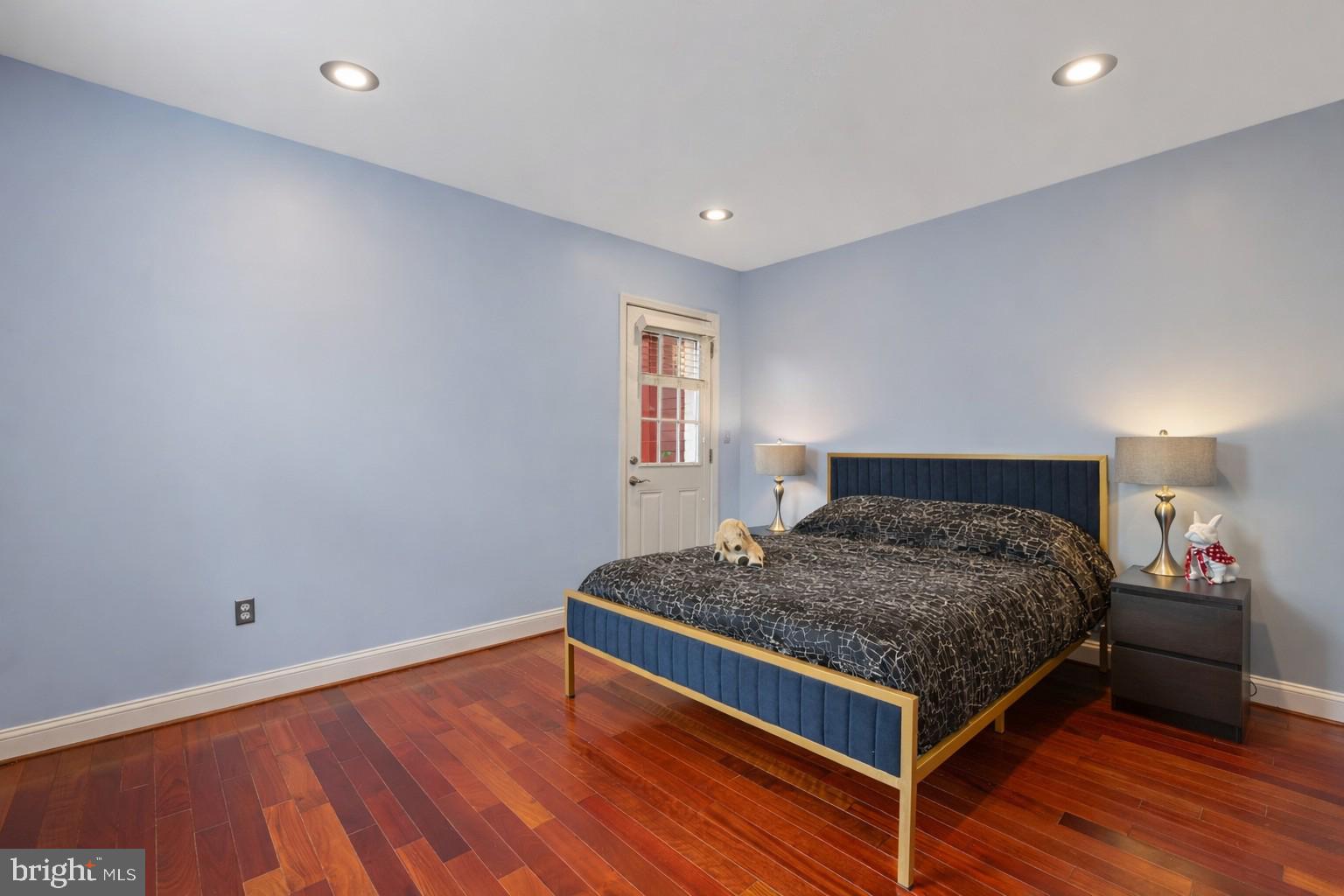 3579 Warder Street Northwest, Unit 3 Washington, DC 20010 - Photo 21 of 25 a bedroom with a bed and window