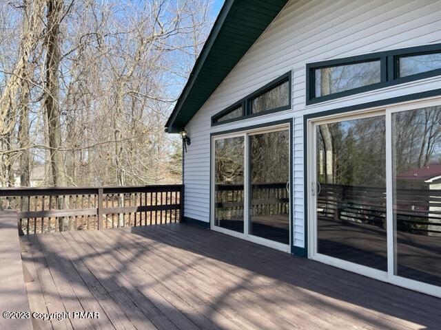 130 Estates Road Greentown, PA 18426 - Photo 3 of 34 a view of a balcony with wooden floor