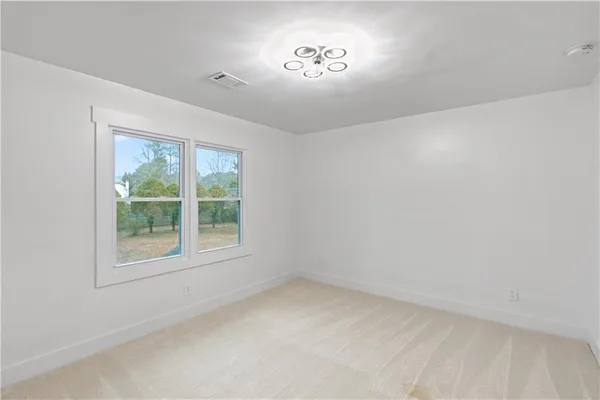 a view of a room with rack on the wall