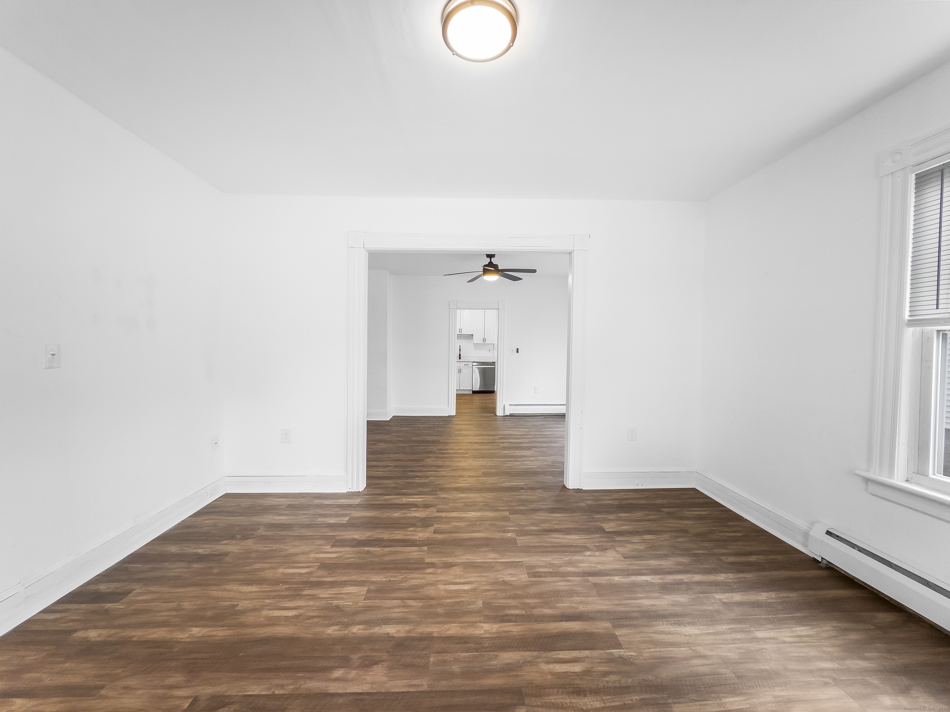 634 High Street, Unit 1 Middletown, CT 06457 - Photo 2 of 16 a view of a room with wooden floor and window