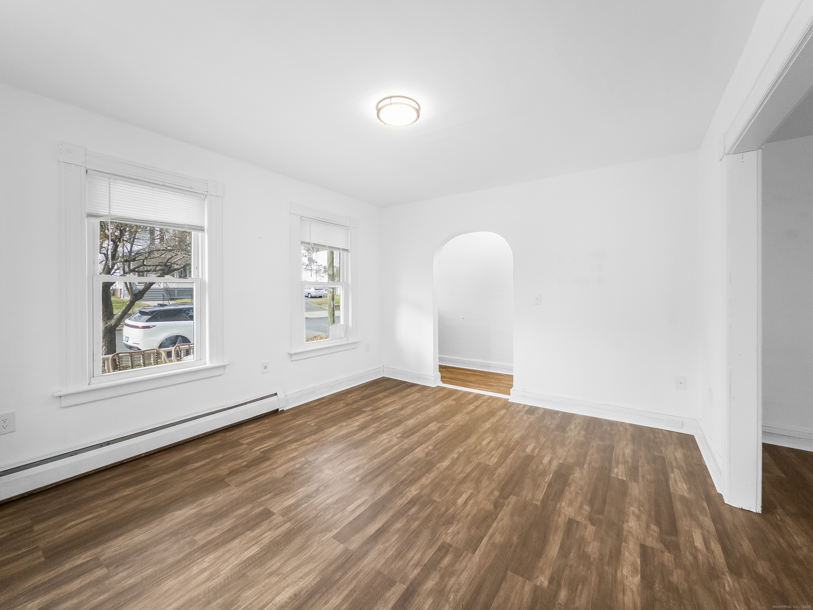 634 High Street, Unit 1 Middletown, CT 06457 - Photo 5 of 16 a view of empty room with wooden floor