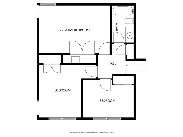 a picture of a park with a white wall