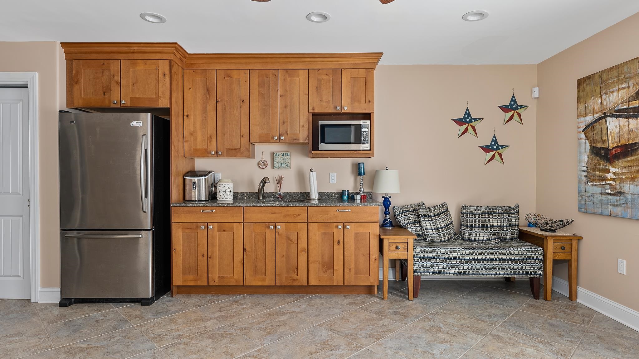 22 80th Street, Unit WEST Sea Isle City, NJ 08243 - Photo 13 of 32 a kitchen with stainless steel appliances granite countertop a refrigerator and a sink