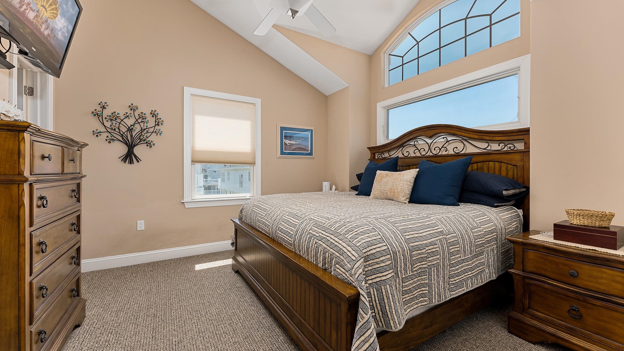 22 80th Street, Unit WEST Sea Isle City, NJ 08243 - Photo 15 of 32 a bedroom with a bed and a window