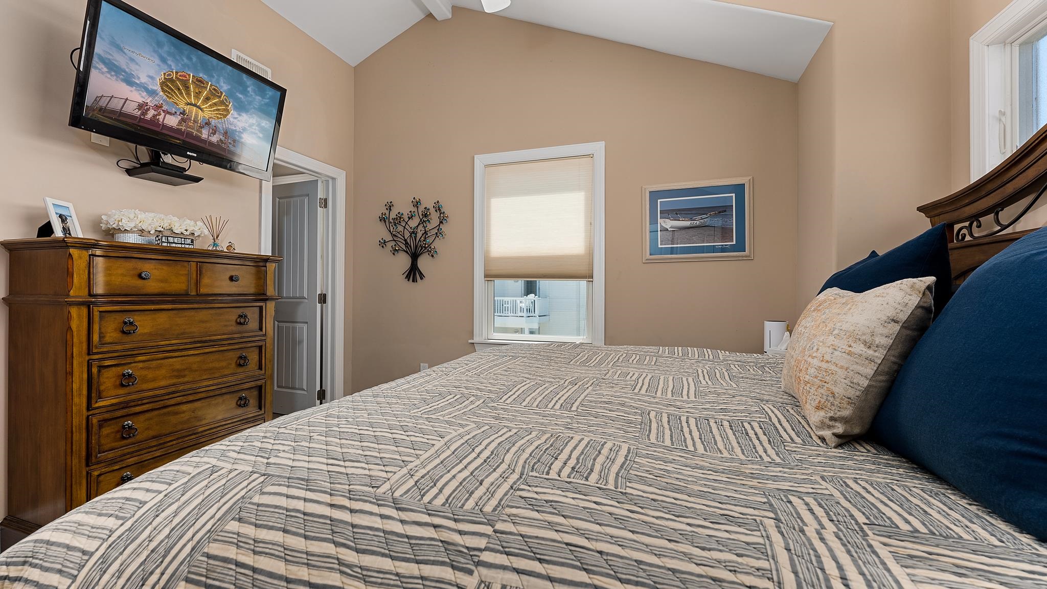 22 80th Street, Unit WEST Sea Isle City, NJ 08243 - Photo 16 of 32 a bedroom with a bed and a dresser