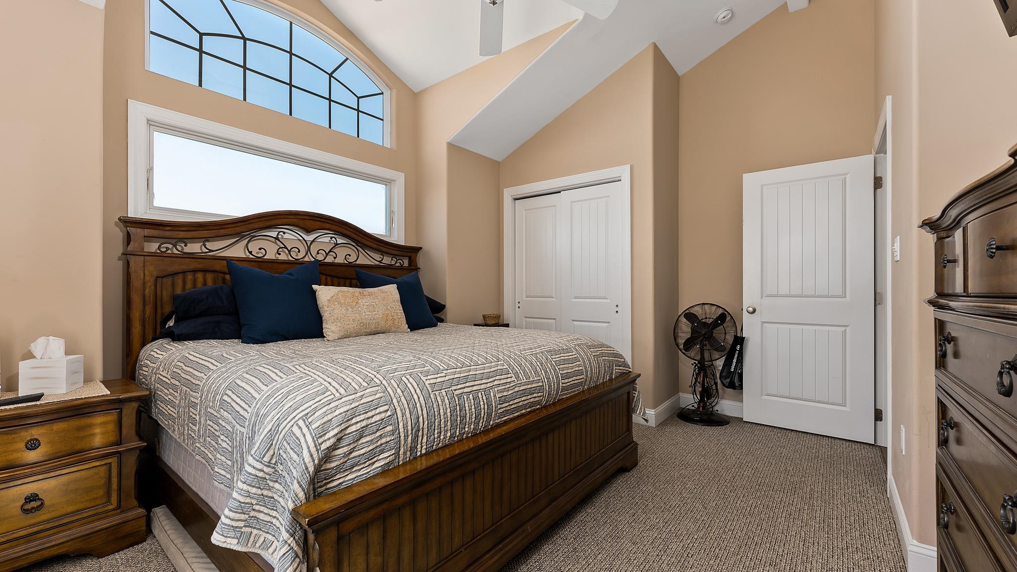 22 80th Street, Unit WEST Sea Isle City, NJ 08243 - Photo 17 of 32 a bedroom with a bed and a mirror on dresser