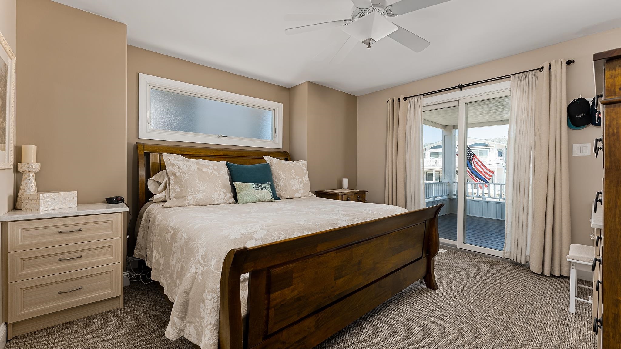 22 80th Street, Unit WEST Sea Isle City, NJ 08243 - Photo 19 of 32 a bedroom with a bed and a window