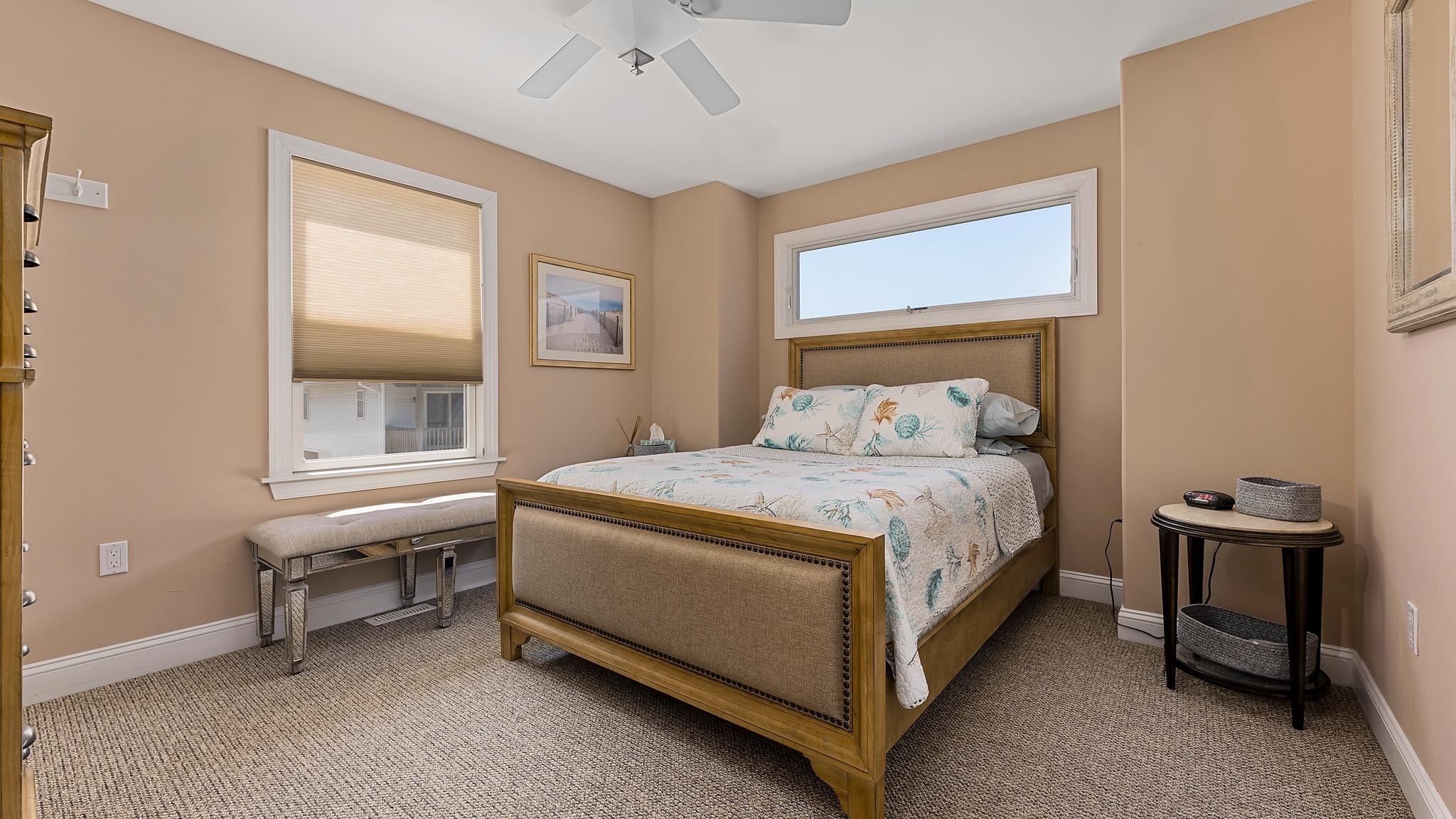 22 80th Street, Unit WEST Sea Isle City, NJ 08243 - Photo 24 of 32 a bedroom with a bed and a window