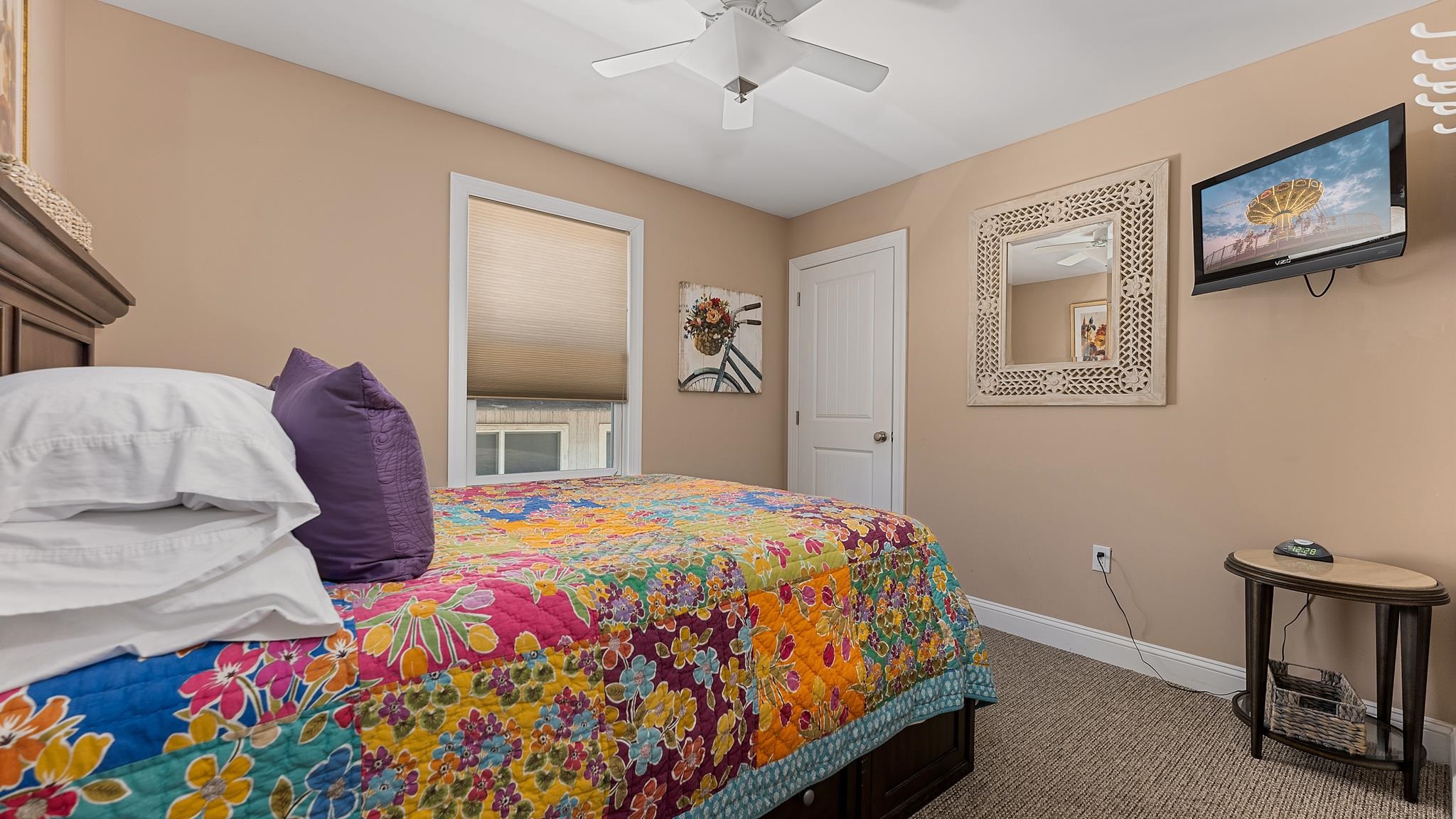 22 80th Street, Unit WEST Sea Isle City, NJ 08243 - Photo 27 of 32 a bedroom with a bed and a lamp on dresser